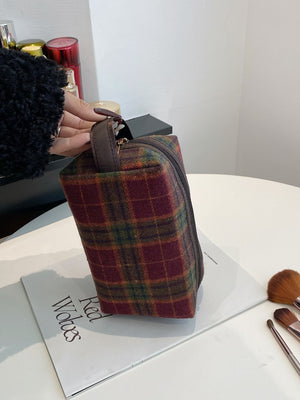 Contrast plaid clutch with zipper, small polyester bag in burgundy and green, ideal for stylish organization.