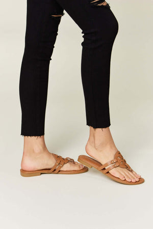 Chic Cutout PU Leather Open Toe Sandals in tan, styled with black ripped jeans for a trendy look.