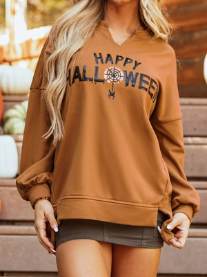 Happy Halloween graphic notched long sleeve top in warm brown, featuring a stylish spider web design.