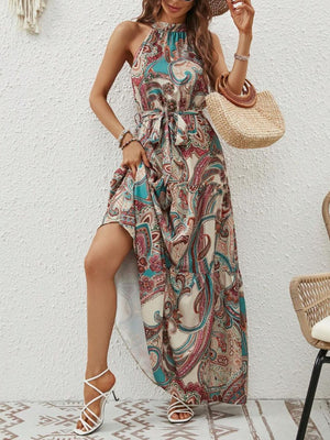 Floral sleeves dress with a tied waist and side slit, perfect for summer fashion. Ideal for casual outings and stylish events.