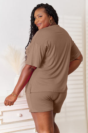 Model wearing Basic Bae soft rayon half sleeve top and shorts set in brown, showcasing relaxed style and comfort.