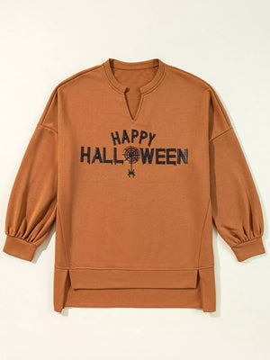 Happy Halloween graphic notched long sleeve loose top in orange, featuring a playful Halloween design and comfortable fit.