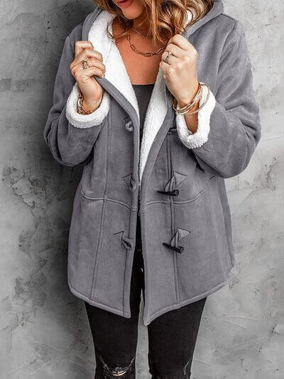 Full size pocketed long sleeve hooded toggle jacket in gray, featuring button closures and a cozy fleece trim.