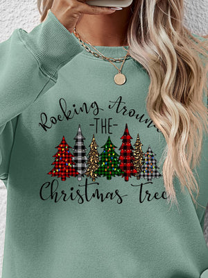 Festive Christmas tree graphic on a cozy sweatshirt in green, perfect for holiday celebrations.
