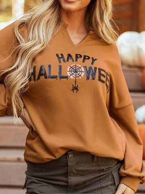 Happy Halloween graphic long sleeve top in warm brown, featuring a spider web design, perfect for festive fall wear.
