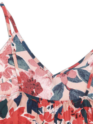 Close-up of the backless design and floral print on a frill sleeveless midi dress.