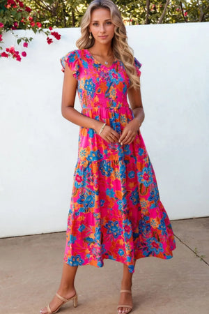Boho floral V-neck ruffle tiered dress in vibrant colors, perfect for summer or casual outings.