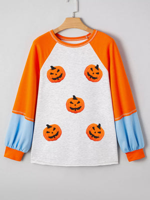 Halloween pumpkin print long sleeve t-shirt with orange sleeves and blue accents, perfect for festive fall celebrations.