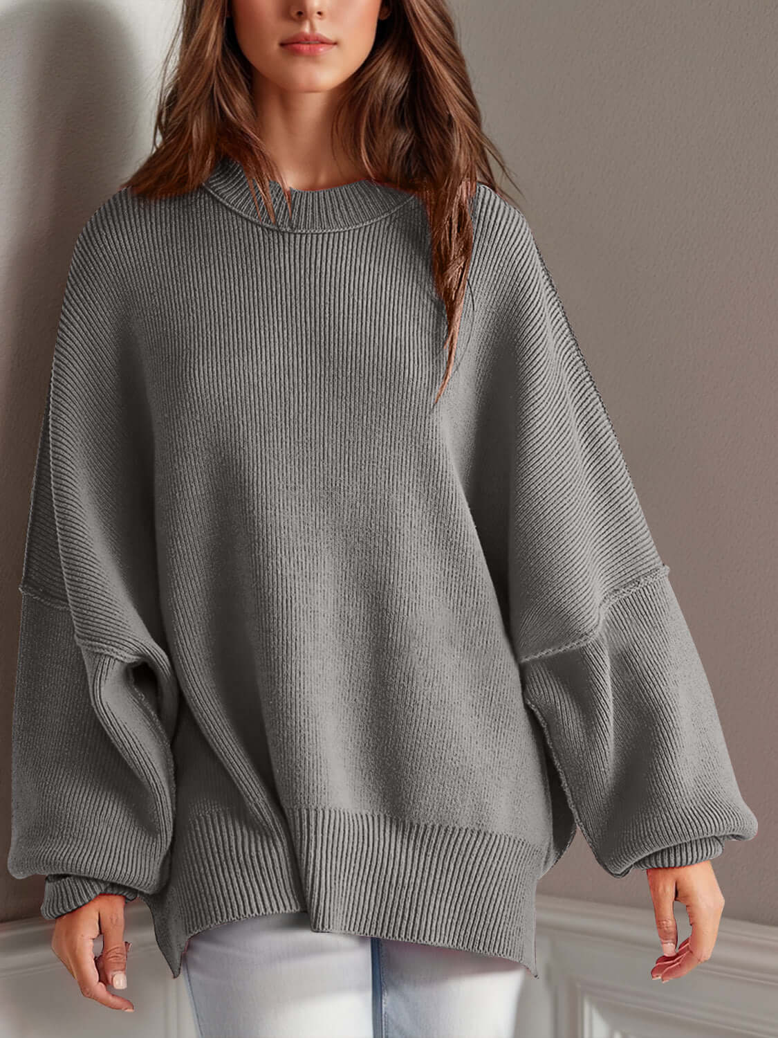 Chic side-slit sweater in gray, cozy round neck design perfect for winter fashion.