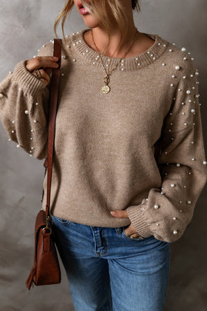 Pearl detail round neck long sleeve sweater, stylish and slightly stretchy, pairs perfectly with casual jeans.