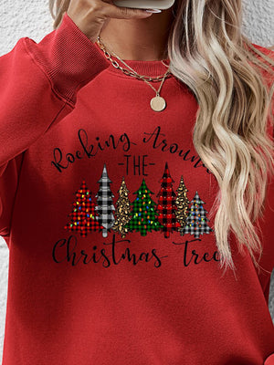 Red sweatshirt with Christmas tree graphic and 'Rocking Around the Christmas Tree' text, perfect for holiday wear.