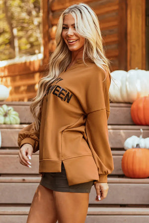 Happy Halloween long sleeve sweatshirt in brown, featuring sequin text, styled with a sheer high-low hem, perfect for the festive season.
