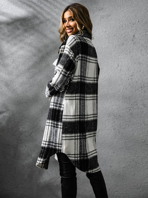 Chic plaid collared long sleeve coat in black and white, perfect for stylish layering during chilly weather.