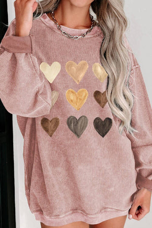 Heart-themed round neck sweatshirt in soft pink, featuring velvety hearts in gold, beige, and brown.