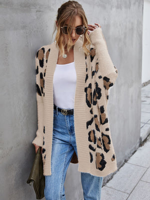 Casual leopard pattern fuzzy cardigan styled with a white tank and jeans, perfect for a chic everyday look.