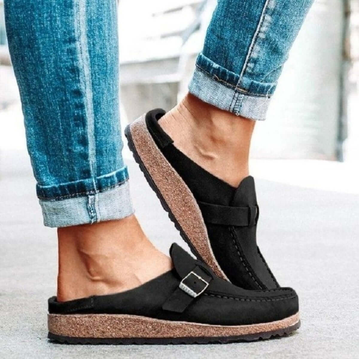 Stylish round toe low heel buckle loafers worn with jeans, showcasing their comfortable and trendy design.