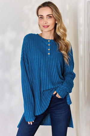 Model wearing Basic Bae ribbed high-low T-shirt in teal with button detail and long sleeves.