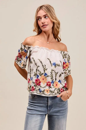 SO ME Floral Embroidered Two Way Off The Shoulder Blouse, featuring colorful embroidery and ruffled sleeves.