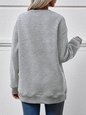 Back view of a grey Christmas tree graphic sweatshirt, showcasing the relaxed fit and comfortable design.