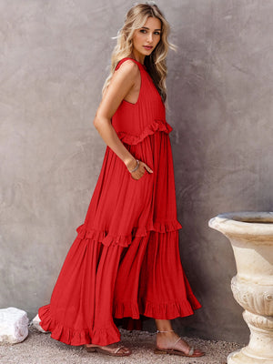 Red ruffled sleeveless tiered maxi dress with pockets, perfect for summer outings.