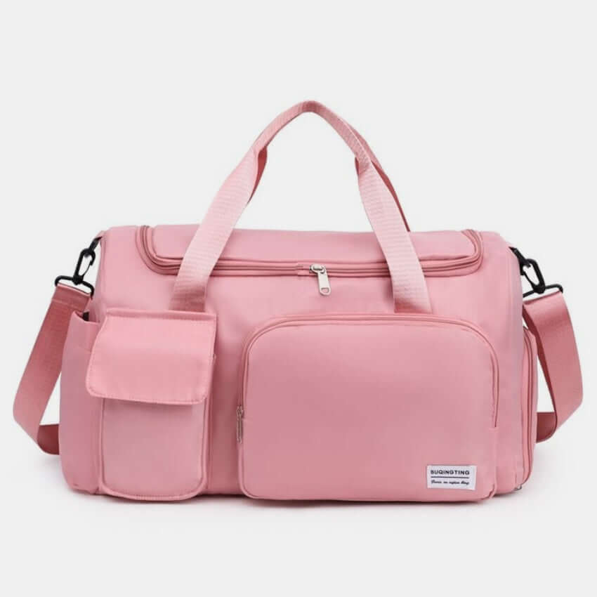 Oxford cloth detachable strap travel bag in pink, oversized with multiple pockets, perfect for travel and storage.