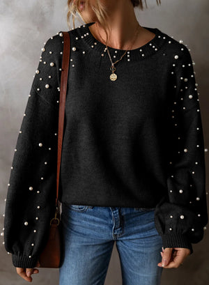 Pearl detail round neck long sleeve sweater in black, featuring a relaxed fit and stylish pearl embellishments.