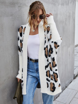 Casual leopard pattern fuzzy cardigan with open front, styled with jeans and accessories, perfect for a trendy fall outfit.