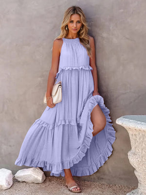 Ruffled sleeveless tiered maxi dress in soft lavender with pockets, perfect for summer outings.