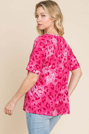 Model wearing BOMBOM Leopard V-Neck Short Sleeve T-Shirt in pink, showcasing trendy leopard print design.