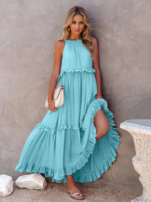 Ruffled sleeveless tiered maxi dress in turquoise, featuring pockets and a flowing design.