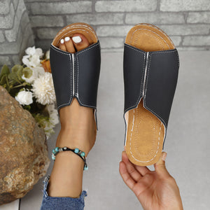 Stylish PU leather open toe sandals with low heel, featuring a sleek design and comfortable fit for all-day wear.