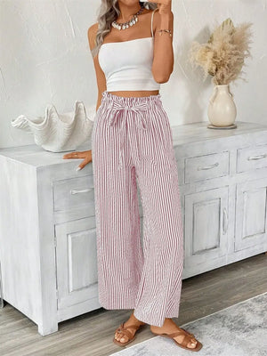 Plus size striped wide leg paper bag pants, casual outfit with a cropped top, perfect for summer styling.