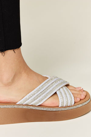 Side view of Forever Link Rhinestone Platform Wedge Sandal, showcasing sparkling straps and stylish wedge design.