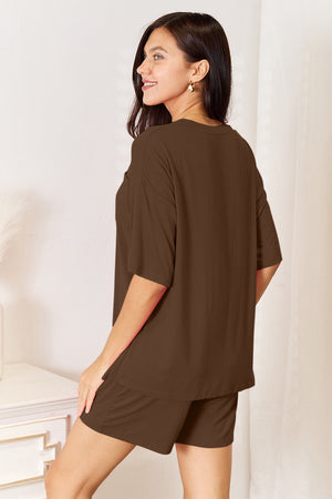Model wearing Basic Bae soft rayon half sleeve top and shorts set in brown, showcasing a relaxed and stylish look.