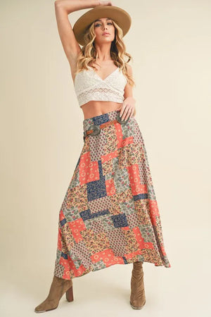 Aemi + Co Printed Maxi Skirt featuring a bold patchwork design, perfect for casual or dressy summer occasions.