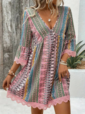 Lace trim printed V-neck 3/4 sleeve dress in vibrant colors, perfect for casual summer outings.