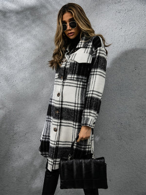 Chic woman in plaid collared coat with long sleeves, stylish sunglasses, and a handbag, perfect for chilly weather.