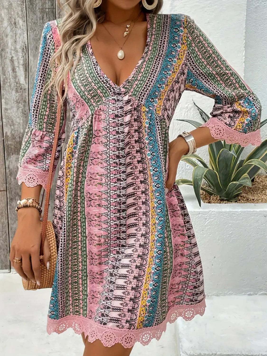 Lace trim printed V-neck 3/4 sleeve dress with colorful patterns, perfect for casual outings.