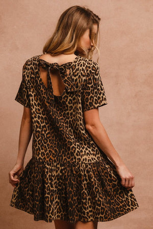BiBi tie back leopard round neck short sleeve dress with unique design and adjustable fit, perfect for special occasions.