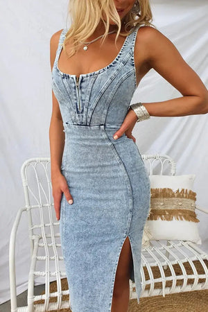 Model wearing a side slit washed denim dress with scoop neck, showcasing a fitted silhouette and casual style.