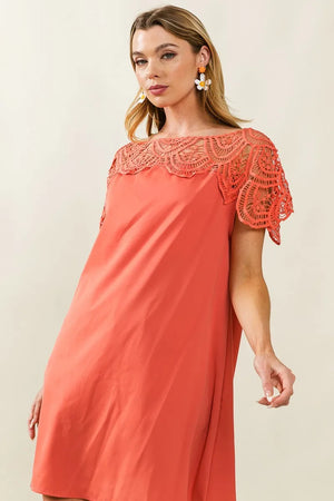 BiBi Crochet Lace Yoke Detailed Wrinkled Dress in coral, showcasing intricate crochet lace detailing and a flowy silhouette.