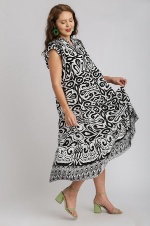 Umgee Plus Size Two-Tone Midi Dress with Ruffle Cap Sleeves and Border Print in black and white