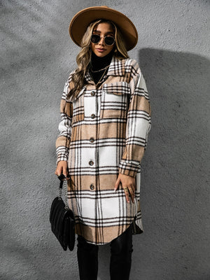 Chic plaid collared long sleeve coat in beige and white, worn by a stylish woman with sunglasses and a hat.
