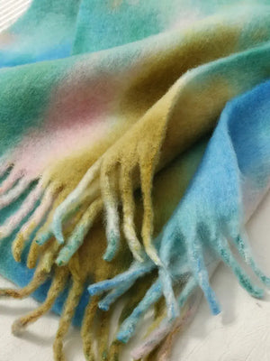 Fringe tie-dye polyester scarf in shades of blue, green, and yellow, measuring 78.7 x 12.6 inches, lightweight and stylish.