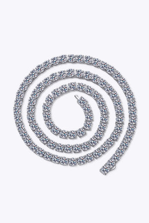 Stunning moissanite rhodium-plated necklace displayed in a spiral pattern, showcasing its minimalist and modern design.