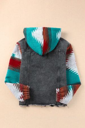 Back view of a denim jacket with a colorful hood and tribal pattern, perfect for casual wear.