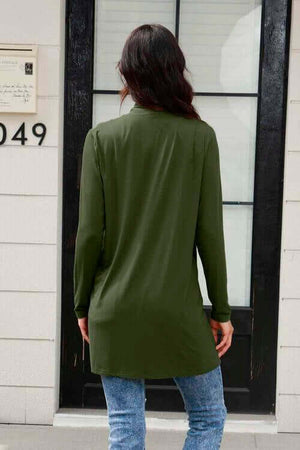 Back view of Basic Bae full size long sleeve cardigan in olive green with pockets, styled with jeans.