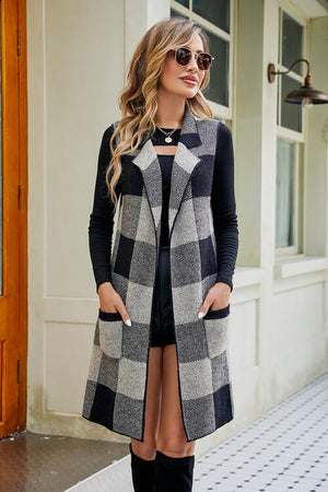 Plaid open front sleeveless cardigan with pockets, styled with black top and sunglasses, perfect for layering.