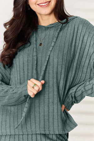 Cozy Basic Bae ribbed hood top in teal, showcasing drawstring detail and relaxed fit.