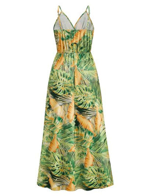 Printed surplice spaghetti strap dress featuring a vibrant tropical leaf pattern with an elegant flowy silhouette.